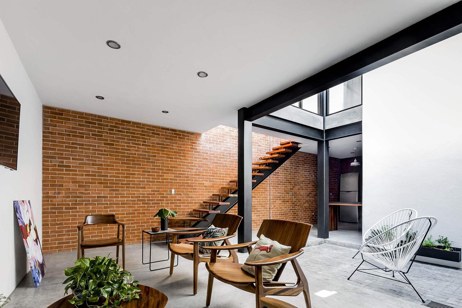 Brick wall brings unique textural element to the living room